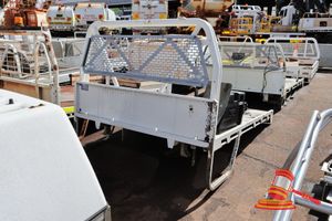 37 · WHITE UTE TRAY, APPROX; 2.4M L X 1.8M W X 1.3M H, SOME RUST/SCRATCHES TO FRAME, WATER TANK, RUBBER MUDFLAPS (INCOMPLETE), OPEN TRAY, HAS TUFF-A-TANK