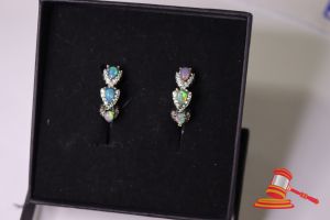 69 · OPAL EARRINGS