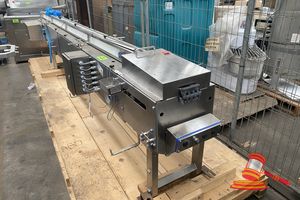 13 · STAINLESS STEEL CONVEYOR SYSTEM WITH INTEGRATED SORTER/DIVERTER UNIT, MODULAR BELT CONVEYOR. STAINLESS STEEL. ON TRAVEL PALLET. APPROX 4M X 700MM X H850MM. (UNTESTED)