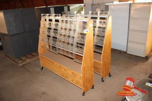 110 · 2 X MOBILE TIMBER A4 DISPLAY STANDS. APPROX 1400 X H1300MM