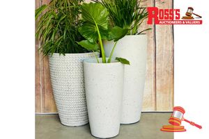 Pair of Grey Artisan Planters - Size: 38 x 53 cm each, RRP $220 Create a stylish designer display from the 2197 Bradie Pot range, featuring a tall round tapered planter with a smooth ornamental finish, this range brings a clean, contemporary look to homes, patios, courtyards, entryways and landscaped spaces. Constructed from stone-resin composite: 50% stone, 45% high-density resin and 5% fibreglass, it combines practical lightweight handling with a premium look. It is designed for indoor and out
