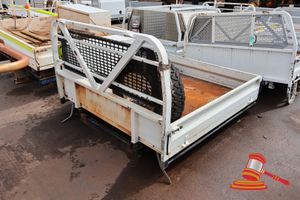 29 · METAL UTE TRAY, APPROX; 1.9M W X 1.8M L X 1.2M H, CONTAINS A SPARE WHEEL, TOOL STORAGE CONTAINER, AND A FIRE EXTINGUISHER, SOME MARKS/RUST