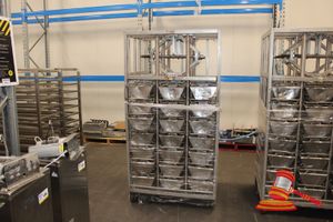 115 · EBERHURDT GMBH STAINLESS STEEL MOBILE MANUAL SPINDLE PRESS. APPROX 1010 X 870 X H1970MM. INCLUDES APPROX 21 X STAINLESS STEEL MOULD TRAYS (APPROX 300 X 820 X H200MM). NO SPINDLE PRESS HANDLE