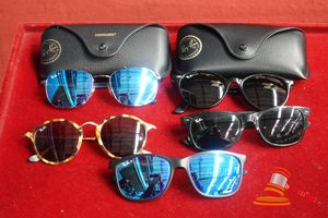 5 PAIRS ASSORTED SUNGLASSES MARKED RAY BAN. ASSORTED USED CONDITION. AUTHENTICITY UNVERIFIED