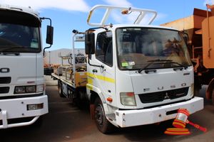 4 · 2013 Mitsubishi Fuso Fighter FK600 Truck White, 4 x 2, Auto, Diesel Reg #: Unlicensed ODO: 14,639 kms Showing on Clock Eng #: 6M60177485 VIN: JLFFK62FL0KJ10047 Features: 2 Hose Reels, Racking Fixed on Tray, Engineers Vice Under Tray Storage Box (Asset # ST1157), (*Key # 33, WP#4929*) Condition: Panel: FAIR, Paint: FAIR, Glass: FAIR, Tyres: FAIR Dash: FAIR, Upholstery: FAIR, Floor: FAIR Overall Condition: FAIR