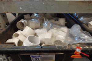 397 · BOX OF ASSORTED PVC MALE AND FEMALE ADAPTERS OF VARIOUS SIZES