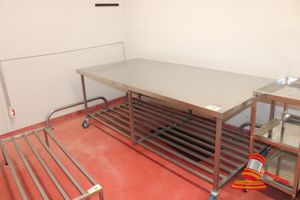 35 · HD STAINLESS STEEL MOBILE WORK/PROCESSING TABLE WITH UNDER SHELF RACK. APPROX 2250 X 1070 X H850MM. 1 X SMALL HOLE IN TABLE TOP CORNER