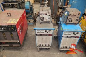 1 X Cigweld Transmig 400 Mig Welder With Separate Wire Feed Unit, Transmig 4r, Part No:704686, Sn:M060501031, 3 Phase, Untested (Some Marks / Rust) Approx; 930mm D X 350mm W X 1m H, On A Trolley