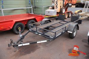 2003 Custom Plant/Golf Cart Trailer, Black, Single, Reg #: 1TPC611, Expiry: 1/04/2027 VIN: 6T9T20AAF30AAB057 Features: Multiple Tie Down Points, 7 Pin Connector, LED Lights, Tiltable With 400mm Ramps, Deck Approx 1300 x 2400mm. Condition: **Front Wheel Delaminating, Rust Across Frame, Scratches Across Frame.** Panel: FAIR, Paint: FAIR, Tyres: FAIR, Overall Condition: FAIR