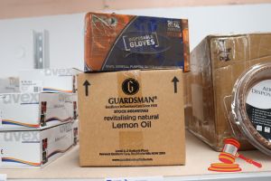 148 · BUNDLE WITH 12x BOTTLES OF GUARDSMAN REVITALISING NATURAL LEMON OIL, 473ml AND 2x BOXES OF DISPOSABLE GLOVES