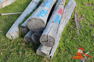 201 · BUNDLE OF 7 X JARRAH STRAINER POST LOGS, 1.7 - 2.2 M LONG, ALL 250mm DIAMETER