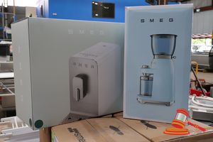 29 · 1 X SMEG BEAN TO CUP COFFEE MACHINE, MODEL: BCC13EGMAU, 220-240V 50-60HZ 1235-1470W, GROSS WEIGHT: 11.7KG, UNTESTED (BOXED), 1 X SMEG COFFEE GRINDER, MODEL: CGF11PGAU, 220-240V 50-60HZ 150W, GROSS WEIGHT: 4.78KG, UNTESTED (BOXED)