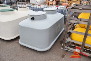 AQUA CELL SEPTIC TANK, DUAL CHAMBER, INLET/OUTLET MARKED, GREY LID, APPROX 2.4M W X 1.5M X 1.4M H, POSS UNUSED, SOME MARKS