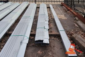 52 · 1 X BUNDLE OF GALVANISED STEEL PURLINS, APPROX 19PCS 130MM X 60MM UP TO 5.2 METRES LONG