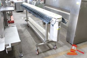 49 · MOBILE SUASAGE LINKER CONVEYOR SYSTEM. STAINLESS STEEL. SOME GREY HOOKS MISSING. 3 WHEELS. APPROX 3.2M X H1.1M. (UNTESTED)