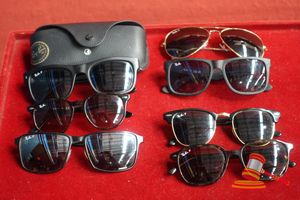 7 PAIRS ASSORTED SUNGLASSES MARKED RAY BAN. ASSORTED USED CONDITION. AUTHENTICITY UNVERIFIED