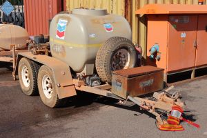 7 · Water Tank Trailer Tandem Wheels, Pump on back of Trailer with pressure system & gauges, Outlets for hose hookup, Key Start Engine, Fire Hydrant & toolbox mounted to Trailer, has Trailer Brakes, All Untested & condition of trailer unknown (IRIS-031443)