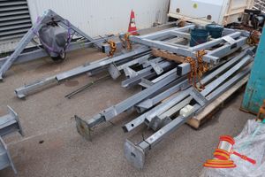 2 X 4 Post Vertical Lift (Trailer) Stackers With Electrical Hoist And W 75 X 75 X H3540mm Ired Pendant Control. Swl 1ton. Disassembled. Includes (Per Stacker) 2 X 75 X 75 X Approx H4500mm And 2 X H3540mm Galvanised Upright Posts With Base Plates, Electric Hoist In Metal Frame With Pendant Control, Lifting Frame (2 Sizes - 1 - Approx 1800 X 2000, 1 - 2660 X 1670mm), Cross/Support Beams, Fittings And Sundry Items. Used By Hire Company To Vertically Store 3-4 Trailers. Can Be Used For Other Lifting