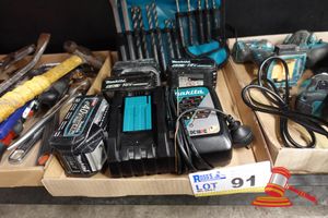 91 · 1 X MAKITA TOOL ROLL WITH DRILL BITS, 4 X MAKITA LITHIUM-ION BATTERIES 1 X MAKITA DUAL PORT CHARGER MODEL: DC18RC, (UNTESTED)