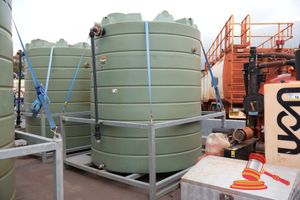 19 · COERCO 14KL POLY TANK IN STEEL FRAME, APPROX; 2.7M W X 2.7M D X 3M H, SOME MARKS (ASSET NO; WT006)