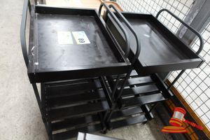 2 X MOBILE SALON TROLLEYS, BLACK METAL, MULTI-TIER WITH SLATTED SHELVES, ON CASTERS, APPROX; 480MM D X 360MM W X 770MM H, SOME MARKS