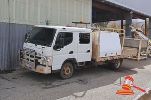 2019 Mitsubishi Canter 815 Dual Cab Truck White, 4 x 2, Auto, Diesel Reg #: 1GTT553, Expiry: 26/09/2026 ODO: 211,524 Kms Showing on Clock Eng #: 4P10D43031, VIN: JLFFEB71G0KJ30342 Features: Air Conditioning, Power Steering, Flat Tray With Gates, toolbox, 2x Fire Extinguishers, Loading Racks. (*Key # 55, WP#4875*) Condition: **Advised Gearbox Issue - Remains In 1st Gear - Tow Truck Required, Mechanical Condition Unknown,Trims Removed In Cab.** Panel: FAIR, Paint: FAIR, Glass: FAIR, Tyres: FAIR, D