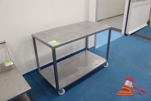 15 · STAINLESS STEEL MOBILE BENCH WITH UNDER BENCH SHELF. APPROX 1200 X600 X 840MM