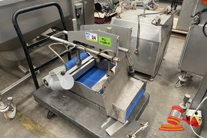 24 · MULTIVAC BELT CONVEYOR SECTION WITH PNEUMATIC PUSHER ASSEMBLY. MODEL: 230956 54. 230V. STAINLESS STEEL. APPROX; 80CM D X 60CM W X 60CM TALL. (UNTESTED)