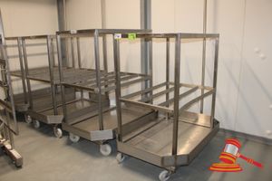 84 · 4 X STAINLESS STEEL 2 TIER MOBILE HANGING/DRYING TROLLEYS (3 WITH HOOKS). APPROX 1410 X 1020 X H1600MM. 1 X LISTED AS 1 X BROKEN WHEEL