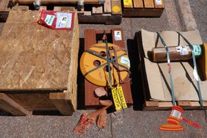 1 X Caterpillar Counterweight Approx 40cm Diameter Strapped On A Pallet (B4865929)