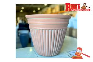 Set of 2 Terracotta Lightweight Round Pots - Sizes: 33 x 33 cm, 33 x 29 cm, RRP $125 A coordinated set of two warm lightweight planters, combining the classic terracotta look with easier handling. Made from lightweight composite material (50% stone, 45% high-density resin and 5% fiberglass). UV-treated for indoor or outdoor use, with drainage.