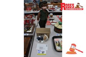 37 · 1 X FRANKLIN MINT PORCELAIN DOLL, DRESSED IN GREEN CORDUROY SUIT WITH CAP, APPROX 450MM, WITH COCA-COLA WOODEN CRATE, ATLANTA GA, INCLUDES SMALL PLUSH DOG (POSS UNUSED)