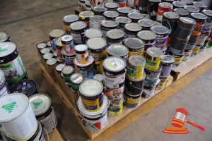 71 · PALLET OF VARIOUS PAINT TINS, VARIOUS BRANDS INCLUDING: DULUX, TAUBMANS, VARIOUS SIZES AND COLOURS, DAMAGED AND LEAKING, ON A PALLET