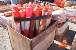 62 · CRATE WITH PLASTIC BOLLARDS AND 2 PALLETS OF WEIGHTED BASES