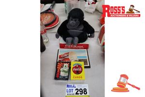 298 · BUNDLE OF COCA-COLA ITEMS INCLUDING: GORILLA PLUSH TOY, PLAYING CARDS ETC