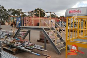 88 · 1 X INDUSTRIAL ACCESS PLATFORM, STEEL FRAME WITH GRATING STEPS, YELLOW HANDRAILS, 6 STEP, APPROX 1.5M HEIGHT (SOME MARKS) APPROX 6m LENGTH