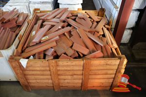 138 · TUB OF DRESSED JARRAH SHORTS - IN CRATE - CRATE INCLUDED