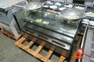 76 · STODDART AXR.FDCTSQ.12 COLD FOOD DISPLAY - SERIAL:240331RO00192. BLACK. UNIT IS DAMAGED -PARTS ONLY. FRONT DOUBLE GLAZED GLASS PANEL SMASHED. FEATURES SQUARE GLASS, 2 X TIER, INTERNAL LED LIGHTING, 2 X REAR SLIDING GLASS DOORS, ADJUSTABLE DIGITAL TEMPERATURE CONTROL, ON FEET, CLIMATE CLASS NORMAL, DOUBLE GLAZED HEATED GLASS, 10 AMP 1 PHASE. APPROX 1224MMW X 565MMD X 676MMH, 113KG. (867814). NOTE: UNIT IS DAMAGED - SOLD AS PARTS ONLY