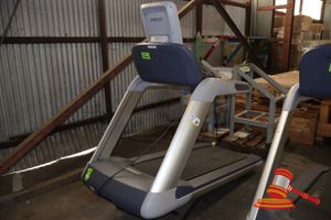 1 X Precor Commercial Treadmill, Model: Trm14.885/833/811, Sn:Ajxhi11140002, Some Marks, Damaged Plastic Trim, Approx; 840mm W X 2m L X 1.5m H , 240v, Untested
