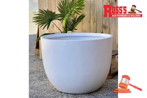 Matching set of 2 Dark Grey Planters - Sizes: 34 x 30 cm, 41 x 35 cm, RRP $175 Create a stylish designer display from the Base Low Planter range, featuring a low tapered round planter with a smooth finish, this range brings a clean, contemporary look to homes, patios, courtyards, entryways and landscaped spaces. Constructed from lightweight fibreglass-clay construction, it combines practical lightweight handling with a premium look. It is designed for indoor and outdoor use, UV resistant, Draina