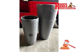 47 · Pair of Clay Rust Planters - Size: 23 x 42 cm each, RRP $90 Create a stylish designer display from the 2003 Tolly Pot range, featuring a tall round tapered planter with a smooth finish, this range brings a clean, contemporary look to homes, patios, courtyards, entryways and landscaped spaces. Constructed from stone-resin composite: 50% stone, 45% high-density resin and 5% fibreglass, it combines practical lightweight handling with a premium look. It is designed for indoor and outdoor use, UV tre