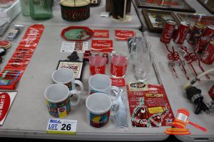 26 · APPROX 26 X COCA-COLA COLLECTIBLE ITEMS, INCLUDES: CERAMIC MUGS WITH VINTAGE DESIGNS, RED DRINKING GLASSES WITH COCA-COLA BRANDING, CLEAR GLASSES, METAL SERVING TRAY WITH VINTAGE COCA-COLA ADVERTISING, BOTTLE OPENER ON CARD, DIE-CAST MODEL CARS IN COCA-CO