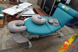 1 X Athlegen Electric Treatment Table, Approx; 1.7m L X 660mm W X 670mm H , Torn Fabric, Untested (Some Marks)
