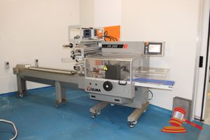 1 · ULMA FR200 HORIZONTAL FLOW PACK/WRAPPER MACHINE. MACHINE No143045. ON CASTORS. 3 PHASE (PLUG). APPROX 5000 X 1400 XH1900MM. NOTE: REMOVED FROM SERVICE 24TH JULY 2026. PURCHASER TO ARRANGE REMOVAL - SPECIALIST REMOVALIST REQUIRED