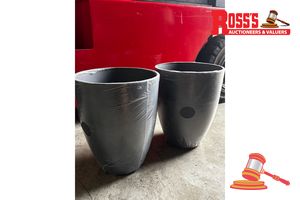 62 · Matching set of 2 Grey Artisan Planters - Size: 35 x 43 cm each, RRP $130 Create a stylish designer display from the 2074 Adam Pot range, featuring a round tapered planter with a smooth finish, this range brings a clean, contemporary look to homes, patios, courtyards, entryways and landscaped spaces. Constructed from stone-resin composite: 50% stone, 45% high-density resin and 5% fibreglass, it combines practical lightweight handling with a premium look. It is designed for indoor and outdoor use