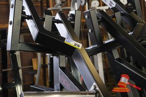 29 · 1 X ISO-LATERAL D.Y.ROW MACHINE, BLACK FRAME, PADDED SEAT AND BACKREST, UNTESTED, APPROX; 1.2M L X 1.4M W X 2.1M H, SOME MARKS, ON A PALLET