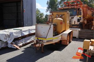 62 · 1 X PORTABLE AIR COMPRESSOR UNIT SAGE OIL VAC TRAILER, TANDEM AXLE,RING HITCH, INCLUDES: AIR COMPRESSOR, OIL/WATER SEPARATOR, FUEL TANK, TOOLBOX,HOSES (SOME RUST / OPERATIONAL STATUS UNKNOWN) ASSET 09H5853/17H7784 (S44#RITM0681400, DR# 1147, MARANDOO)
