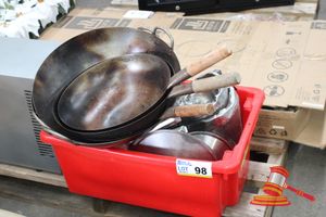 98 · 5 X WOK, VARIOUS SIZES, WOODEN HANDLES (SOME MARKS) 1 X RED PLASTIC TRAY OF KITCHEN UTENSILS, INCLUDES: POT LIDS, ROLLING PIN, STRAINER, TONGS, VARIOUS OTHERS (SOME MARKS) - USED