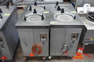 2 X Stainless Steel Mobile Plate Warmers. Approx 520 X 950 X H900mm. Untested