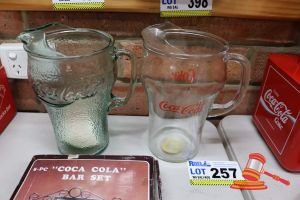 257 · 2x ASSORTED COCA-COLA GLASS JUGS